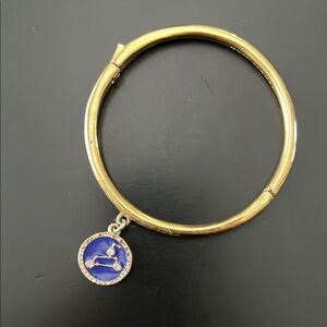 Kate Spade Leo Gold Bangle Bracelet with Blue Charm